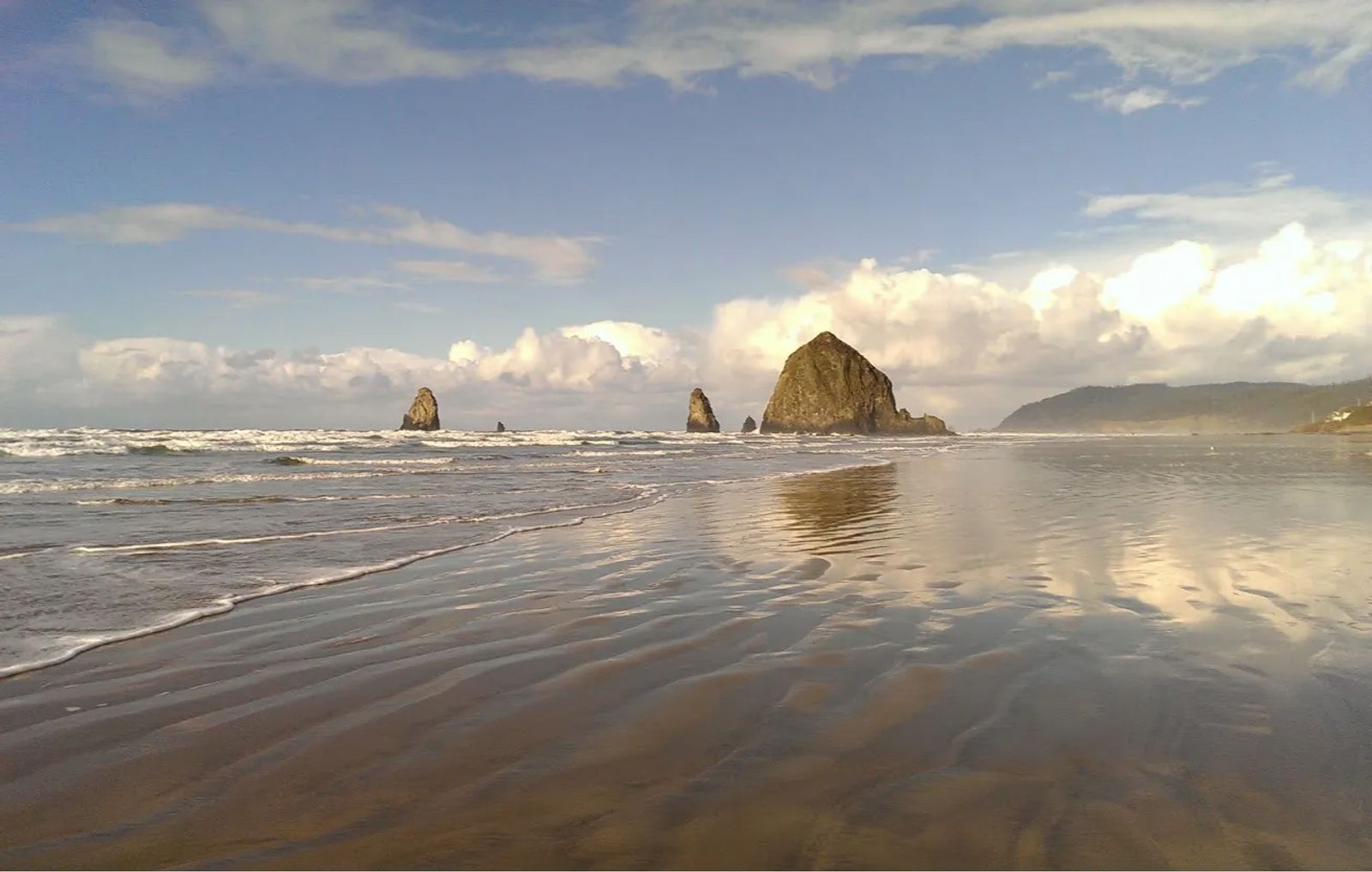 Photo of Haystack Rock and the Needles Rocks off Cannon Beach, Oregon