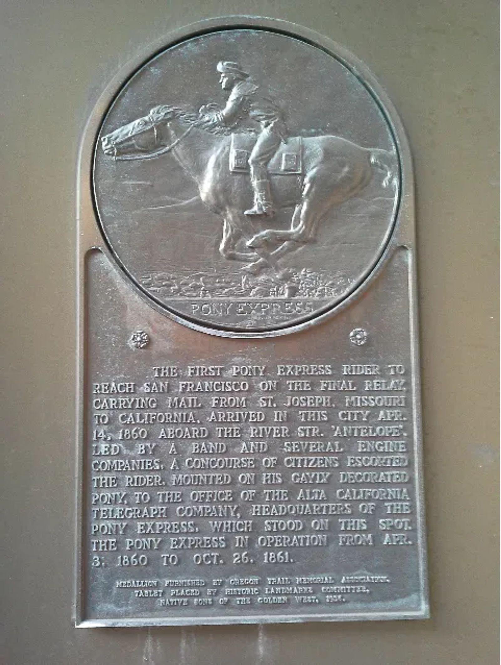 Photo of A plaque that marks the spot of the final destination of the first Pony Express ride in San Francisco, California