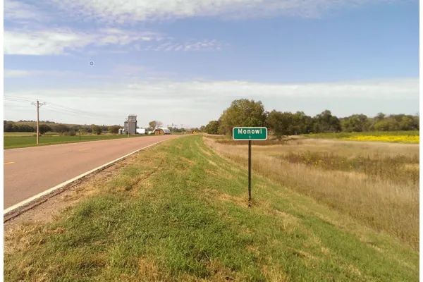 Photo of sign for Monowi, Nebraska, Population one
