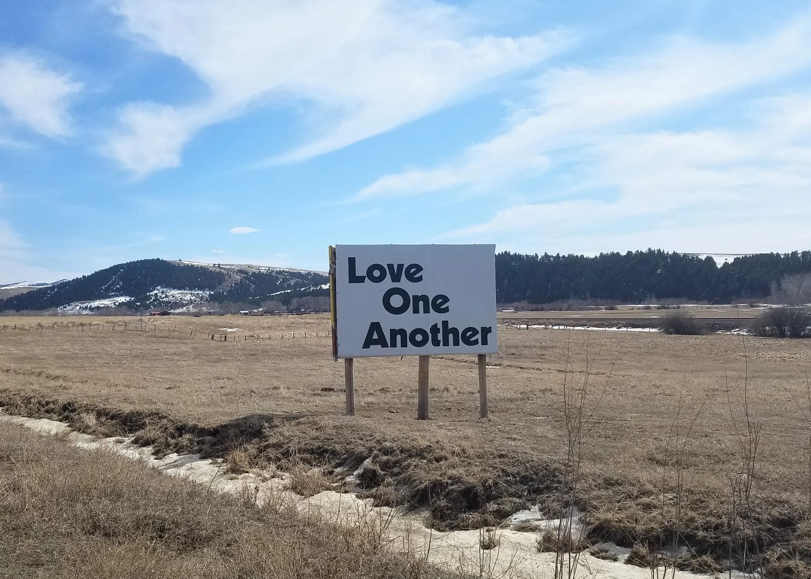 Photo of Love One Another sign near Garrison, Montana