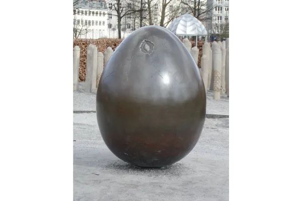 Photo of a dragon's egg, just hatching, in a Copenhagen, Denmark, playground