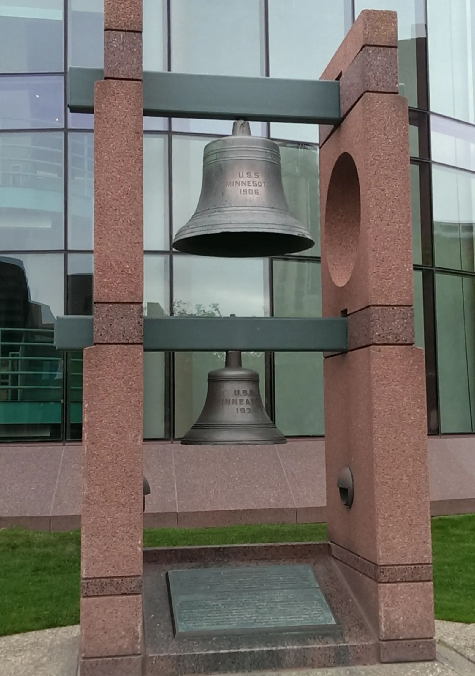Photo of The ship's bells of the battleship USS Minnesota (WWI era) and of the cruiser USS Minneapolis (WWII era), in Minneapolis, Minnesota