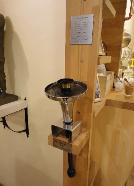 Photo of The Peace Torch displayed inside Madal Cafe, Budapest, Hungary