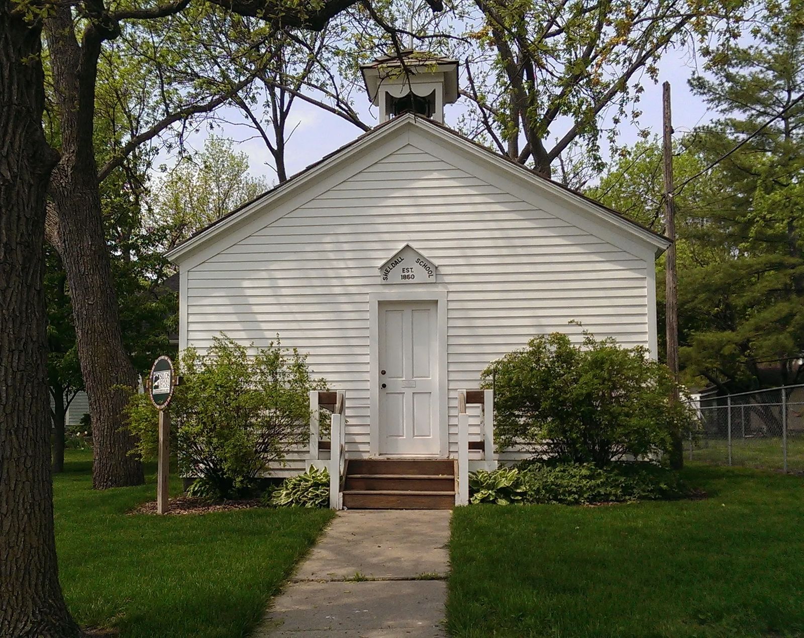 Photo of the belfry of the Sheldall School, in Story City, Iowa