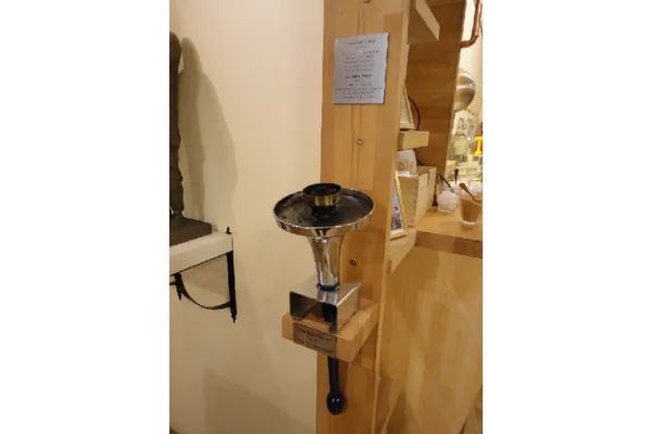 Photo of The Peace Torch displayed inside Madal Cafe, Budapest, Hungary